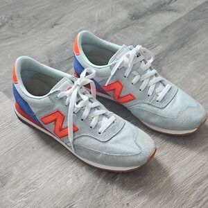 New Balance Retro Light Blue Sneakers with Orange and Blue Accents